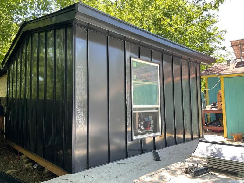 Black standing seam metal wall panels for Metal Roof Installation in Fort Collins