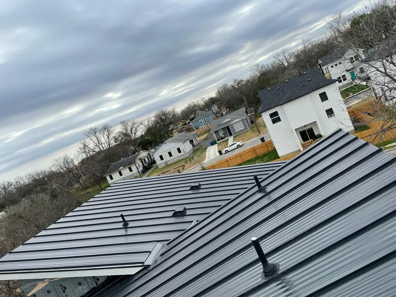 Standing seam metal roof panels with vents for Skylight Repair in Fort Collins